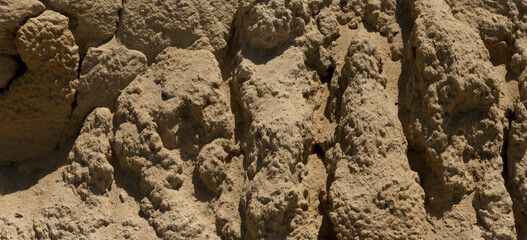 Sandstone. Petrified sand in a quarry. Erosion of the sand hill.
