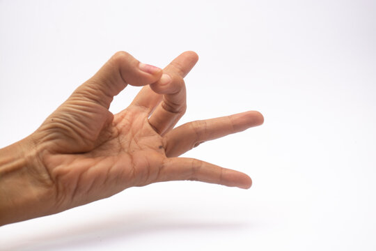 Close up photo of women hand preparing flick with her finger isolated on white background