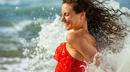 A woman in a vibrant red dress enjoying the sea breeze at a beach with waves crashing behind her.