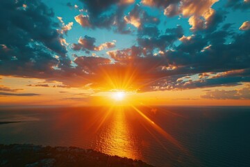 Obraz premium A serene sunset scene with the sun dipping into the water, perfect for use in travel or nature-inspired designs