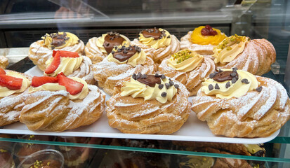 Traditional Italian dessert, pastries in window display in Naples , Italy.