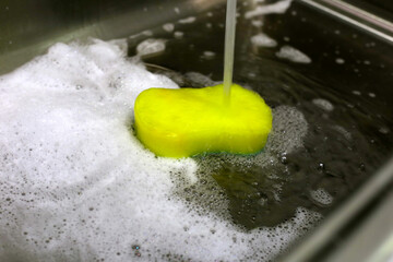 Cleaning the kitchen sink concept