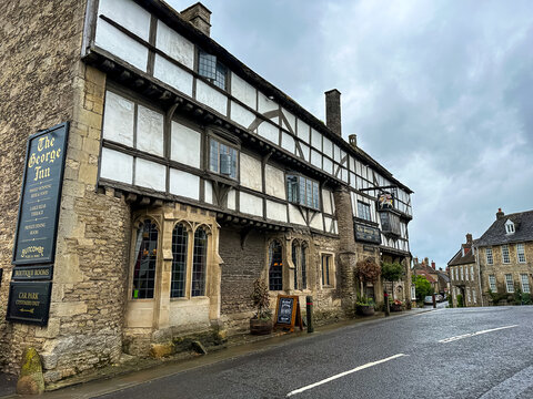 Norton St Philip, Somerset, UK - 25.05.2024. The George Inn Pub located at High Street. The George is an historic 14th-century Grade I listed Tudor inn, located in the heart of Norton St. Philip, Bath
