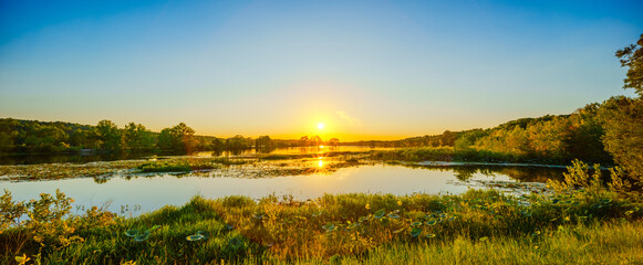 Print photo amazing sunset over a lake with reflection