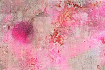 Pink and ochre paint on rustic old wall