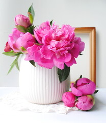 bouquet of pink peonies in vase