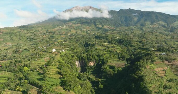 Farmland and rice terraces on the slopes of the Canlaon volcano view from above. Negros, Philippines