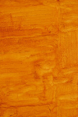 Orange painted wall background pattern
