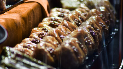 Turkish traditional dessert baklava with pistachio and walnut close up