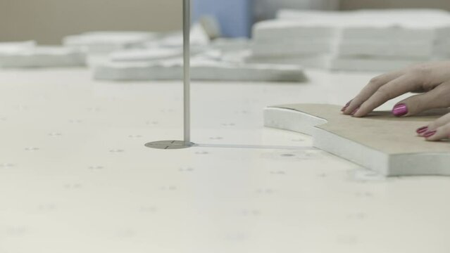 Fabric cutting in textile factory requires precision using cuttingedge tools efficiently