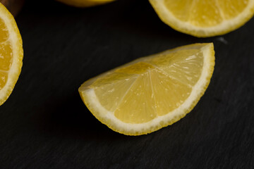 close-up of a table with slices of yellow lemon