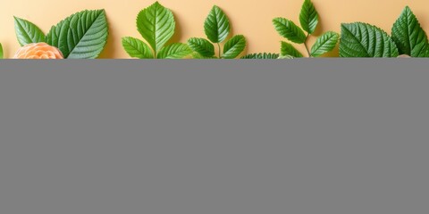 Fototapeta premium Elegant floral arrangement featuring vibrant peach and white roses with lush green leaves on a soft yellow background, perfect for spring and summer-themed designs.