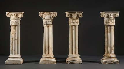 Obraz premium Five classical marble columns with fluted designs and plain capitals