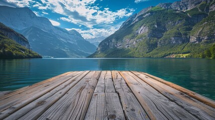 Obraz premium Scenic Lake View: Wooden Pier Amidst Snow-Capped Mountains
