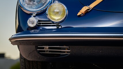 Leather straps on a car hood