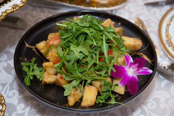 fried potatoes salad on a plate
