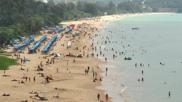 day time phuket island famous tourist crowded karon beach coastline aerial panorama 4k thailand