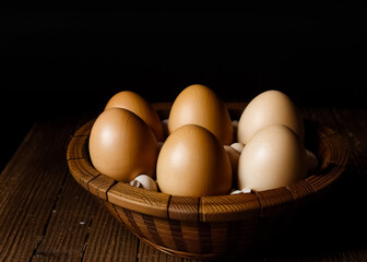 Eggs in wood basket. Generative AI