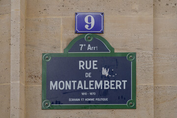 typical vintage parisian street name sign , rue de Montalembert