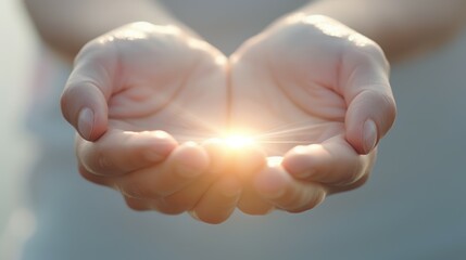 A person is holding their hands open to the sun, prayer concept