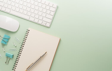 Flat lay, top view office table desk. Workspace with keyboard, office supplies and flower on pastel background.