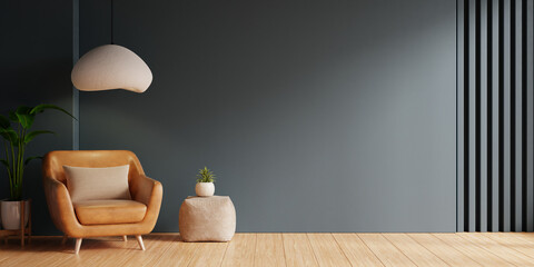 Living room with leather armchair on wood flooring and dark blue wall- 3D rendering