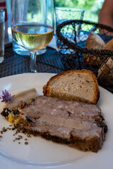 Terrine foie gras fat liver specialty food product made of liver of a duck or goose fattened by force feeding, served in French restaurant in Perigoed, Dordogne, close up