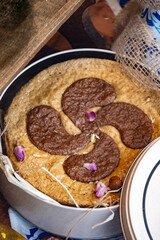 Gateaux tart from Basque Country, brown caramel cheese cake, with different filling, cream, cherry, apricot, walnuts of Perigord, chocolate