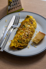 French omelette with seasonal green asparagus vegetables, tasty food for healthy vegetarian lunch