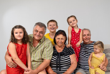 Family portrait of great grandparents with children