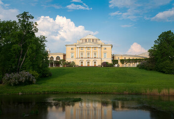 View of the Summer Palace of Emperor Paul I in Pavlovsky park from the Slavyanka River on a sunny summer day, Pavlovsk, Saint Petersburg, Russia