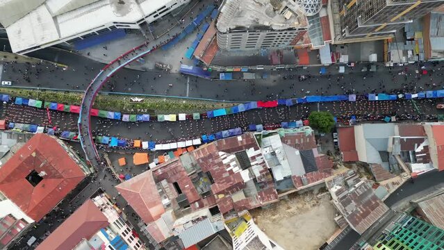 Aerial video over the capital city of La Paz in Blovia, South America
