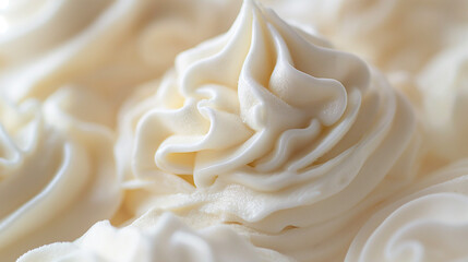 Obraz premium Classic vanilla ice cream swirl, a closeup of classic vanilla ice cream swirls, their creamy texture and soft color against a white background