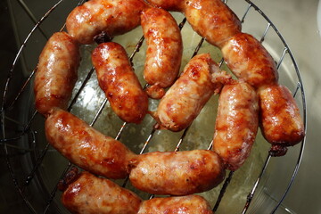 Golden-brown Isan sausages