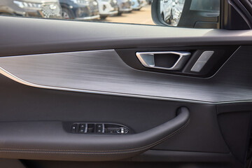 A car door with trim showcasing automotive design details
