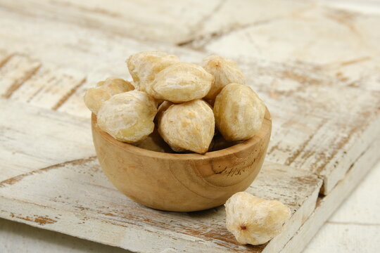 a pile of Candlenuts or kemiri or Aleurites moluccanus	
