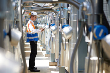 Engineer or technician checking air conditioner control valve at plumbing systems