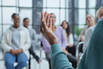 audience of young people sitting in the conference room.