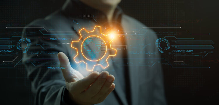 Sphere globe cyber futuristic and technology concept. Businessman showing planet earth icon inside cogwheel gear with HUD futuristic frame on virtual screen. - Powered by Adobe