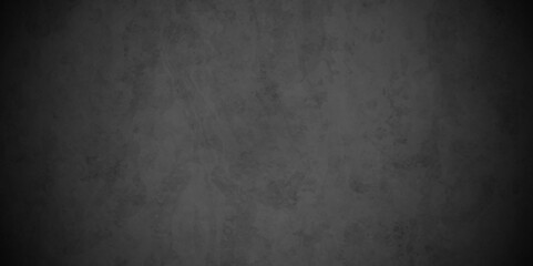 	
Abstract black stone wall texture grunge rock surface. dark gray background backdrop. wide panoramic banner. old wall stone for dark black distressed grunge background wallpaper rough concrete wall.
