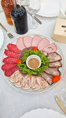 Pork ham, beef tongue, meatloaf, on the festive table