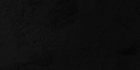 Abstract black stone wall texture grunge rock surface. dark gray background backdrop. wide panoramic banner. old wall stone for dark black distressed grunge background wallpaper rough concrete wall.