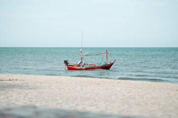 A serene seascape with a lone boat.