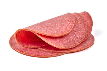 Thin salami sausage slices, isolated on white background.