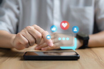 Social media and digital online concept, man using smart phone. The concept of living on vacation and playing social media. Social Distancing ,Working From Home concept.