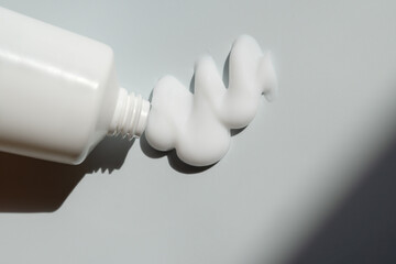 Photo of the texture of cosmetic product with a bottle