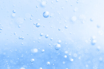 The surface of the cosmetic product has bubbles. blurred background. soft focus