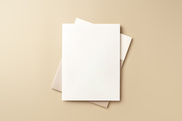 Stack of blank paper on beige background