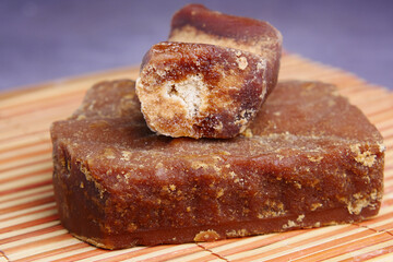  Jaggery traditional cane sugar cube on table 