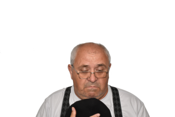 Portrait of an elderly man with a guilty expression on his face. He will regret something very much.